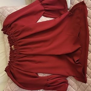 Can be worn off shoulder w/ 3/4 bell sleeve blouse